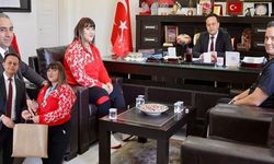 Dünya şampiyonundan anlamlı ziyaret