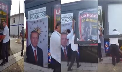 Fransalı Türkler gazete bayilerine asılan ‘Erdoğan diktatör’ afişlerini indirtti