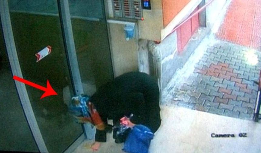 Elindeki sıvı maddeyi asansör ve kapılara süren esrarengiz kadın yakalandı